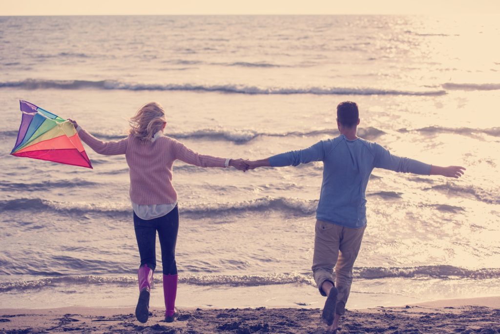 Couple enjoying time together at beach