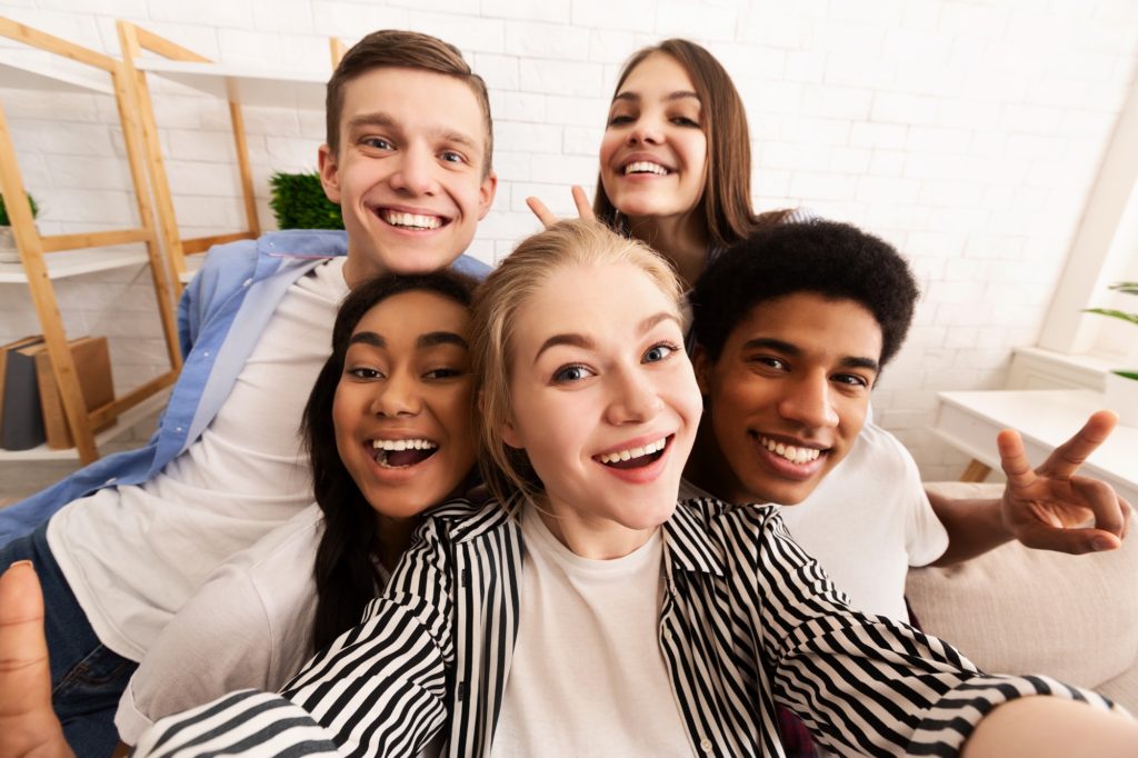 Friendship selfie. Best friend taking photo at home